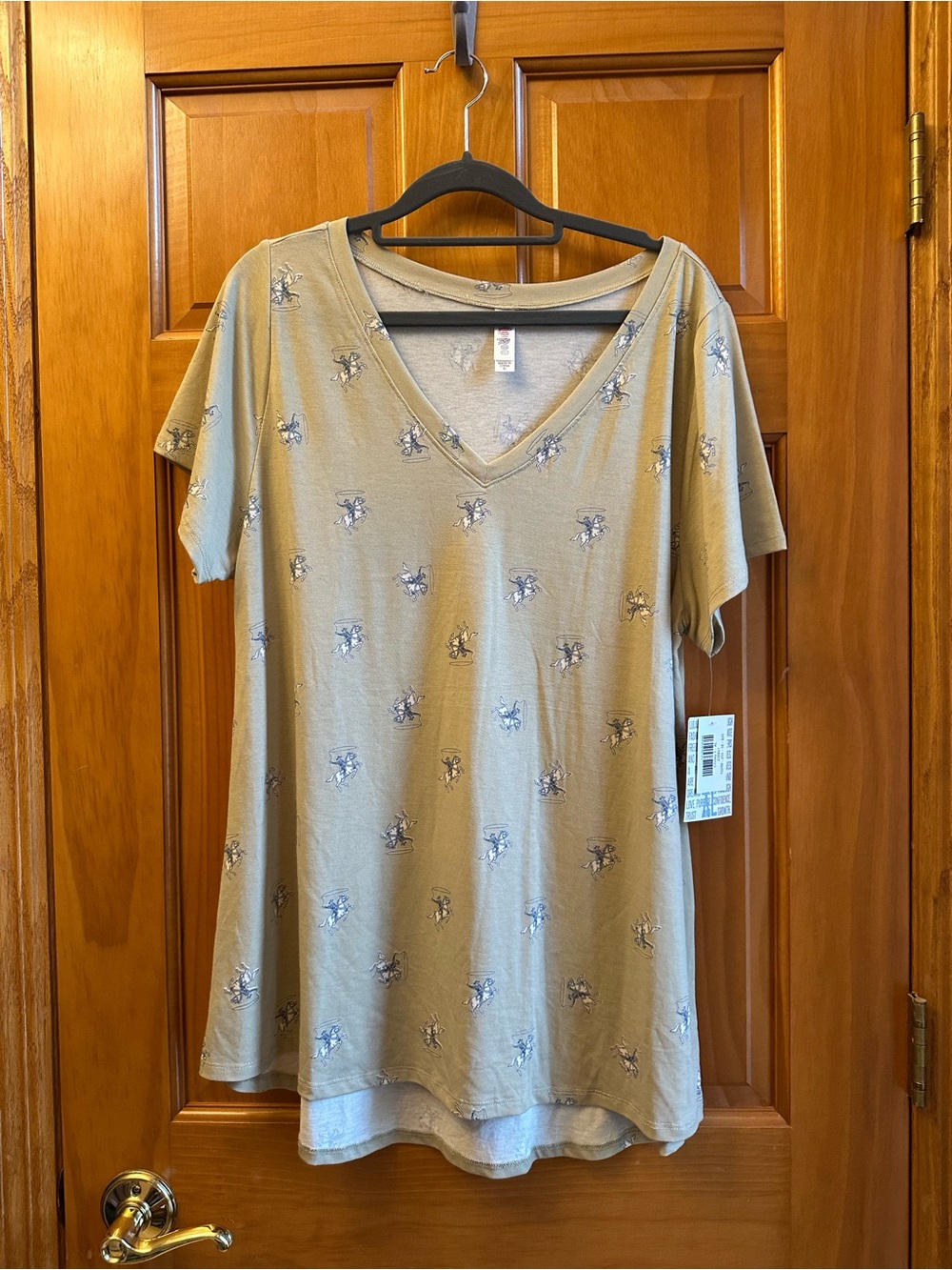 LuLaRoe Christey T V-Neck Short Sleeve Top in Olive with Cowboy Motif